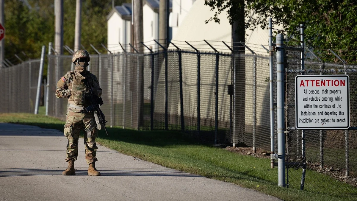 Why is the Texas National Guard in Illinois?